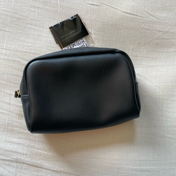 **3/$15** 
Travel pouch - Picture 3 of 5